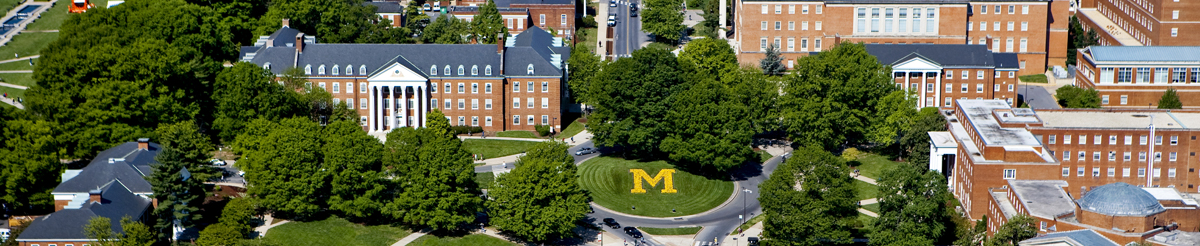 Aerial view of M Circle, intramural fields and campus drive.